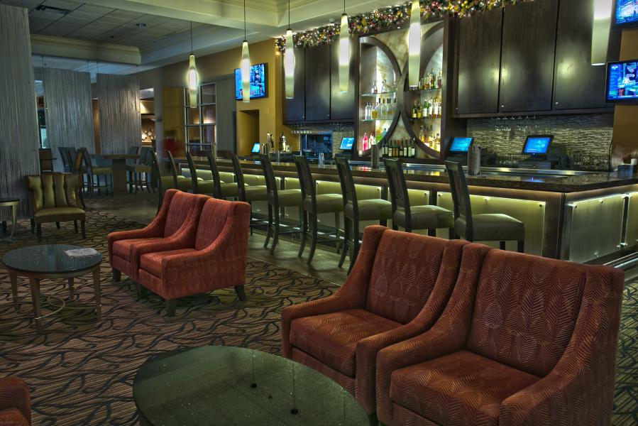 Sleek and chic, Rosen Plaza's Lobby Bar is the place to see and be seen.