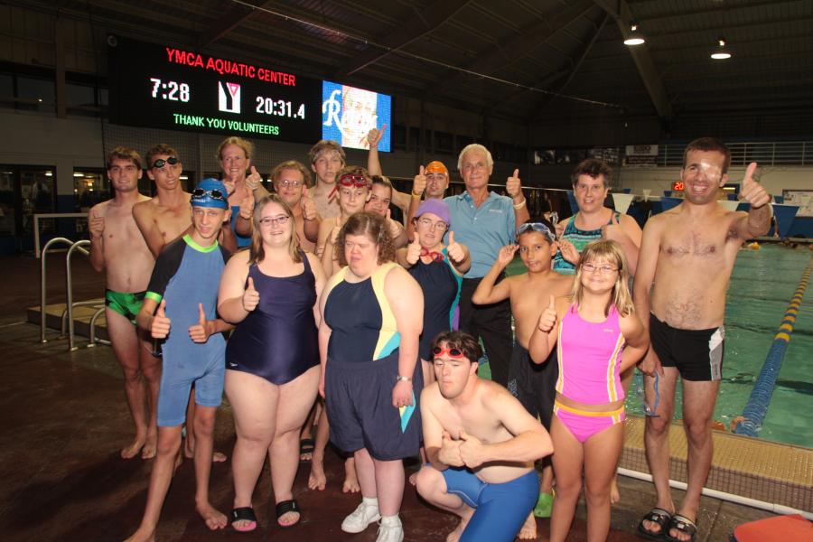 Harris Rosen with group of kids at the YMCA Aquatic Center
